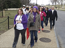 Dr Lorna Myers and Bridget,  team member,  marching for epilepsy