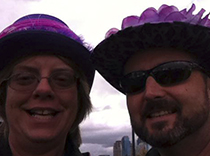 NEREG team members all decked out in purple